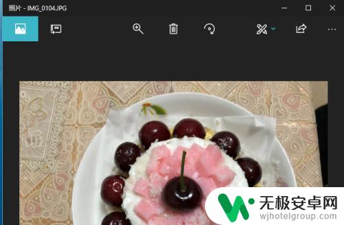 苹果手机怎么放大照片部位 Win10如何使用iCloud浏览iPhone手机照片